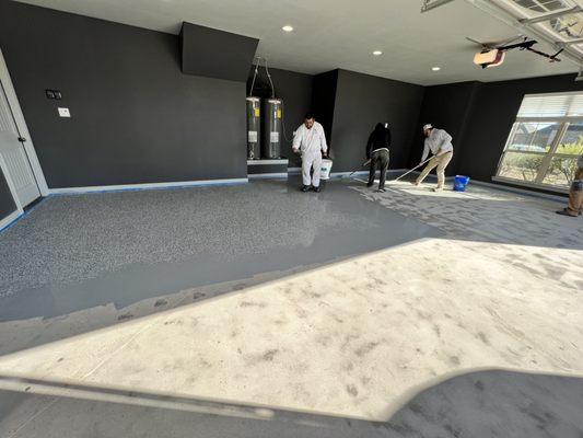 Painted all garage walls, ceiling, and trim. Now the floor gets coated.