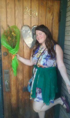 This pic is of my flowers from the shop but taken in front of a different East Town building. Loved the heart window!