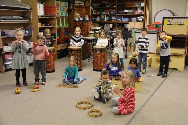 Little Blessings preschoolers enjoy a music program.