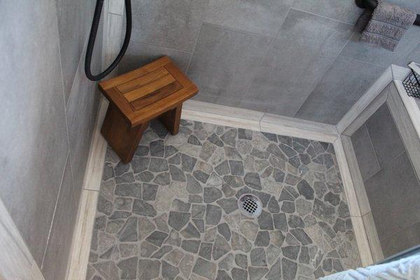 Beautiful #pebblefloor in new #showerremodel #valleyremodelingaz