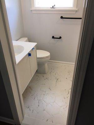 Main bath remodel with floor tile installation.