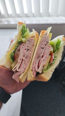 3 Meat(Roast beef, ham, turkey) Deli Sandwich on white