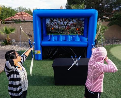 Interactive Hover Archery in use at a Birthday Party.