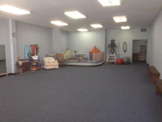 This is the training room.  In the corner is the kid's play area, so you can keep an eye on them, but they are safe and out of the way.