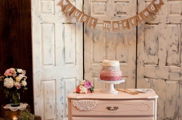 Such a perfect wedding cake display in the barn - all thanks to Simple County Wedding's