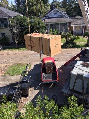 Crane lift of my washer dryer combo purchased at Ideal.