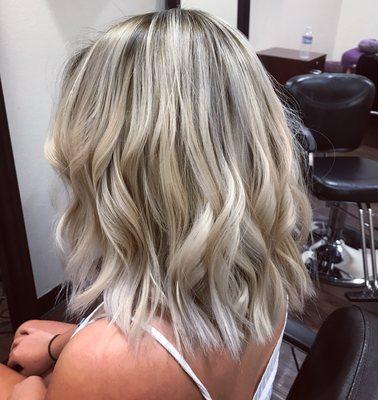 Dimension blonde with a shadow root