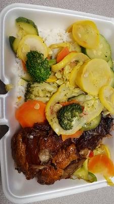 Pork and starchy veggies over rice