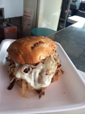 Texas Dip anyone? Brisket dipped in smoky mesquite onion soup topped with carmelized onions and provolone cheese. Dig in!