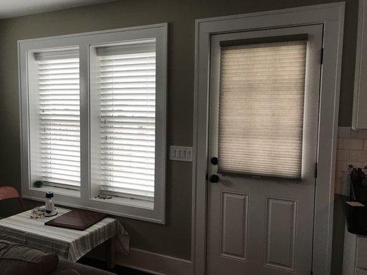 Hunter Douglas blinds.  Door shade, magnetized at the bottom