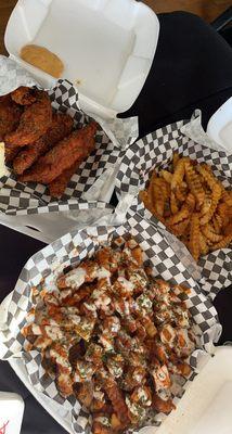 Hot chicken tenders, cajun fries, and buffalo ranch fries