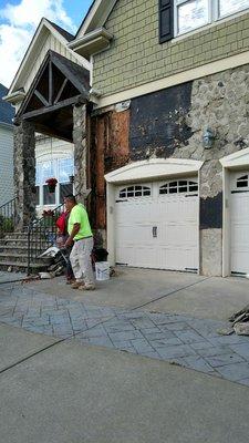 Customer had water issues from poor job Installation. So the team removed all the stone veneer and repaired all rotting wood