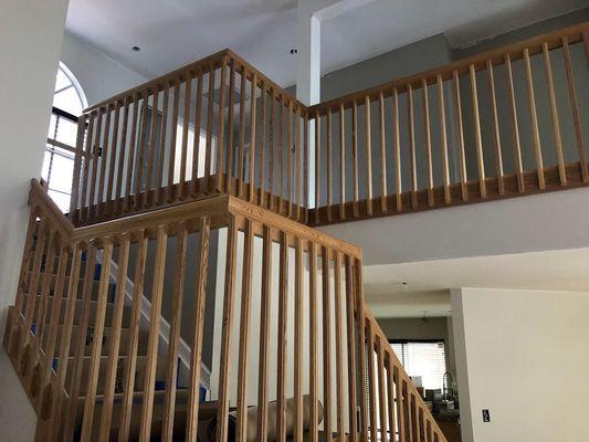 Interior Staircase with Wooden Railing - Before