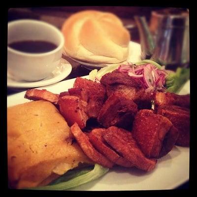 Peruvian breakfast. Tamal. chicharron. Peruvian Coffee.