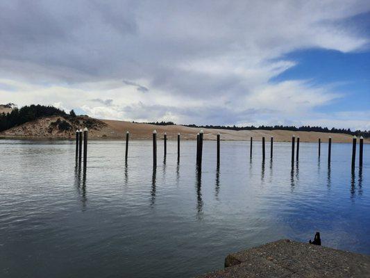 Siuslaw River with Oregon dunes in background