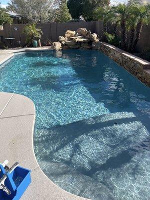 A beautiful oasis of a pool kept clean and clear by Horton Aquatics!