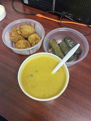 Lentil soup, grapes leave and falafel.