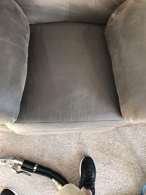 Badly pet stained recliner after cleaning.