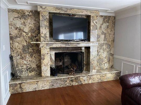 Check out our new granite fireplace! Crafted with precision, it's all about elegance. Let it be your room's centerpiece, radiating warmth.