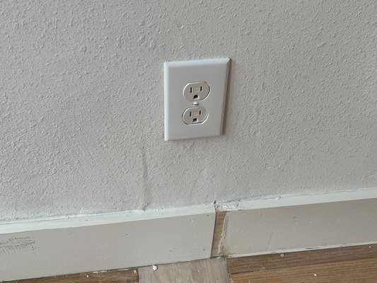 Bad sheetrock patch and baseboard joint