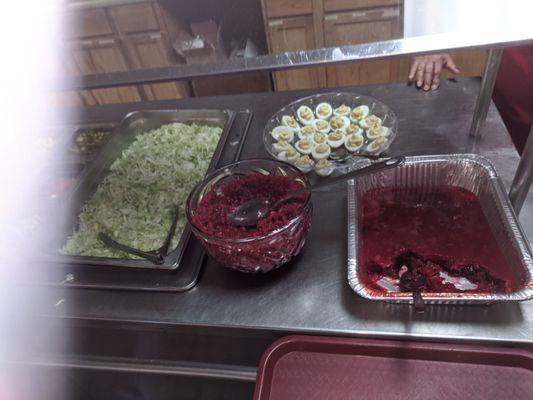 Thanksgiving extras included two type of cranberry salad and delicious deviled eggs (I had a dozen myself)