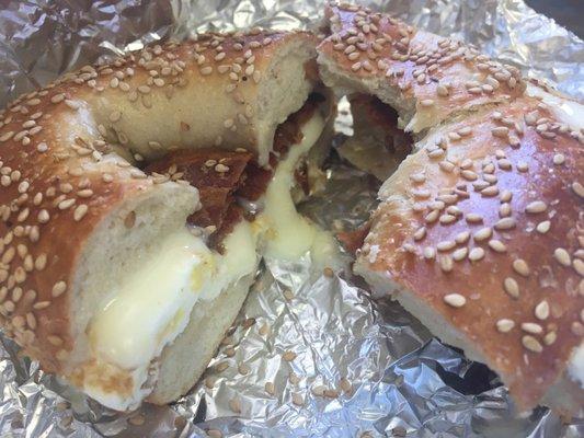 Sesame bagel with egg, cheese and bacon. About $5.