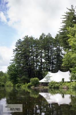 The wedding tent from the lake - Isabella Freedman wedding photos