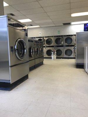 Washers (on left), and dryers on the wall