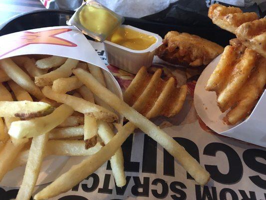 Array of different fries and honey mustard