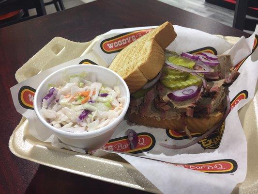 Brisket sandwich w/ a side of slaw. Meat was dry and lacked flavor. The pulled pork is better.