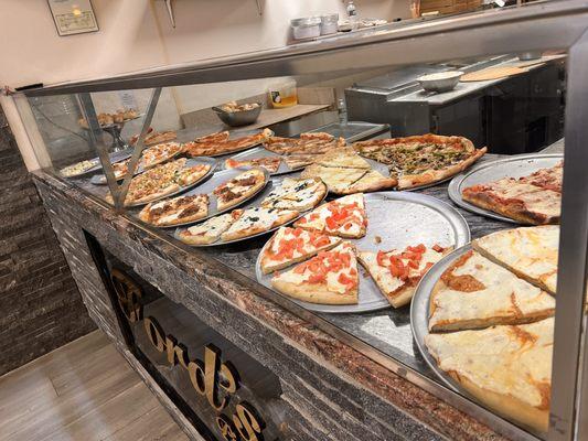 Great selection of pizzas for a quick lunch bite!