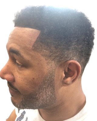 Professional taper cut with beard trim.