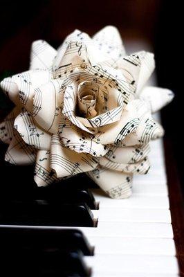 Paper flowers made of vintage sheet music, from the crimson poppy