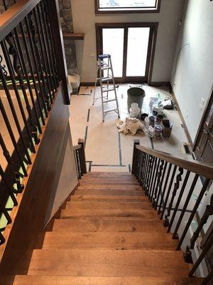 Staining floors and painting walls. New Construction in Uncasville CT