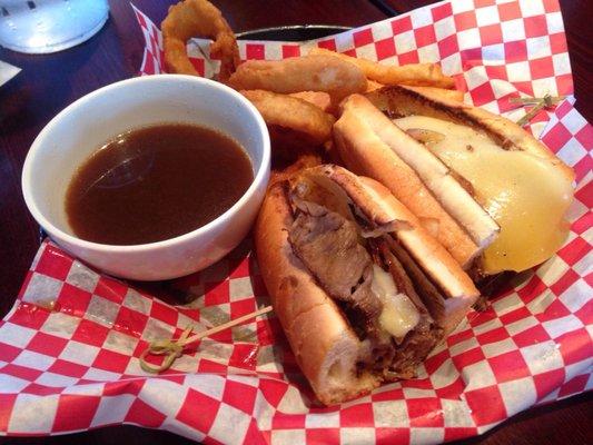 French dip sandwich with onion rings