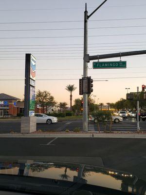 View of station price sign at the street corner