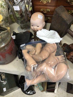 Assemble your own creepy baby doll!