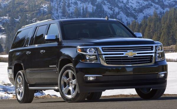 Black Chevrolet Suburban or GMC Yukon , unbeatable in luxury, space and style