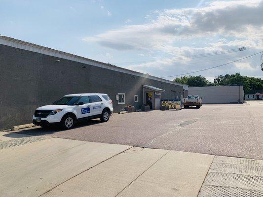 Mid Dakota Properties front door in parking lot view from Main Street