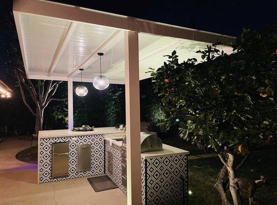 How about an outdoor Kitchen, BBQ with a Patio cover so you can enjoy it rain or shine!