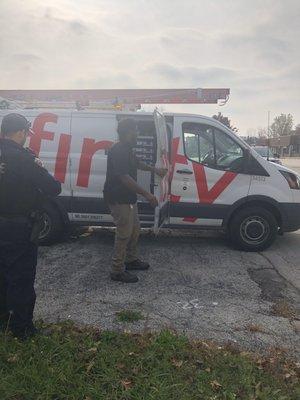 Employee Clyde Smith surrounded by police after assaulting disabled female veteran after tearing cables out of her house