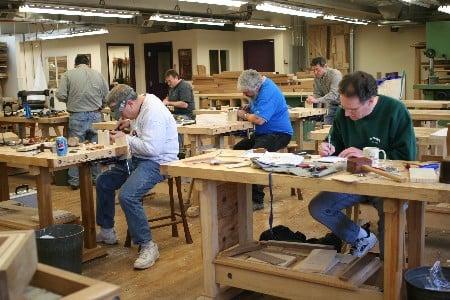 Students hand cutting dovetails