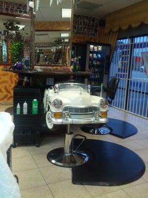 They set up a little kids pedal car as the barber chair obviously for kids! Pretty awesome!