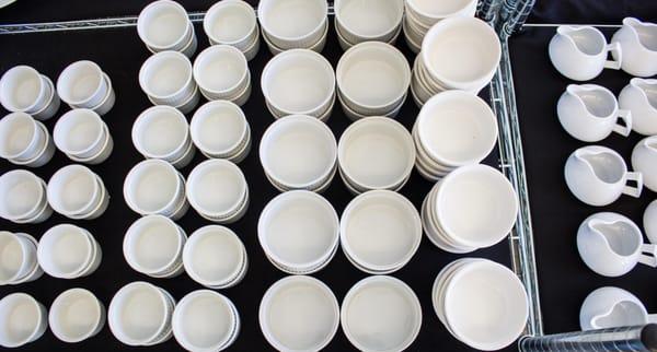 Smallwares, such as cups and bowls, available for individual or bulk purchase.