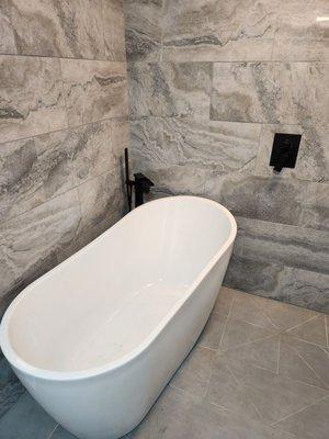 Free standing bath and bathroom remodelled