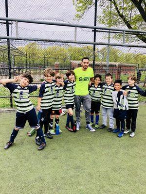 Coach Mike with our spring 2017 U9 team.