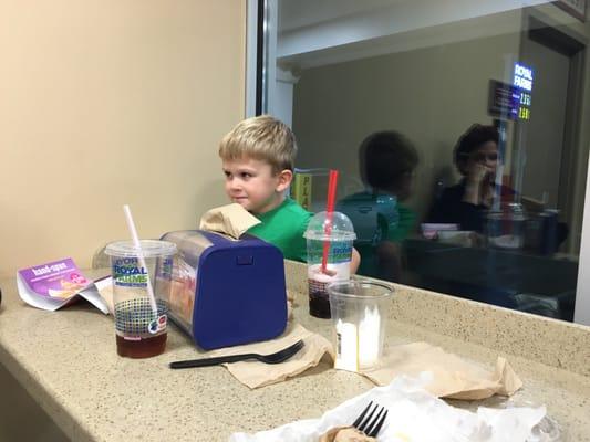 Large play area between eating table and glass.