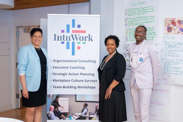 The IntuWork team wraps up a strategic action planning workshop.