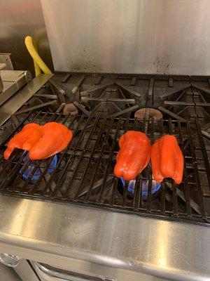 Here we are roasting red bell peppers for one of our sauces.