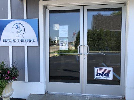 Enter through the glass doors on the north side of the South Haven Business Center.